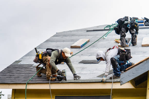 Professional Roofing technician working in Manchaug, MA